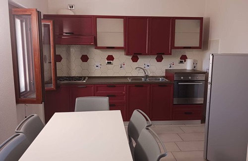 Cala Liberotto Apartment | BLUE HOUSE D: Steps from the Sea with Pet-Friendly Options