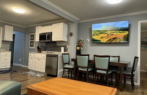 Cave Spring House | Delightful Blue House on the Creek - Top-Rated Family Stay