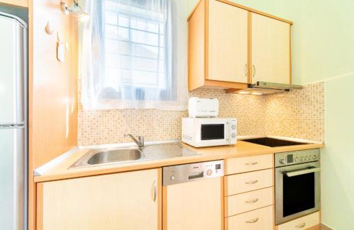 Barbati Apartment | Inviting Blue Lagoon Apartment in Beautiful Barbati