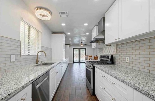 Edgebrook House | Inviting Blue Lagoon Spanish Retreat with Pool & Ocean View
