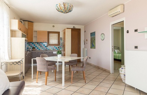 Manerba del Garda Apartment | Idyllic Lago Blu: Pool with Breathtaking Lake Views