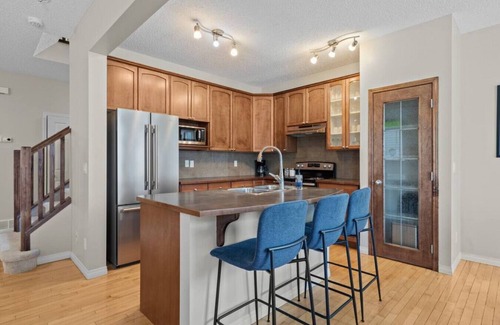 Southwest Calgary House | Pet-Friendly Blue Moon: Backyard Playground Awaits You