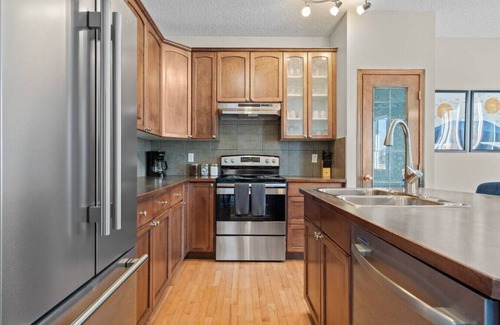 Southwest Calgary House | Pet-Friendly Blue Moon: Backyard Playground Awaits You