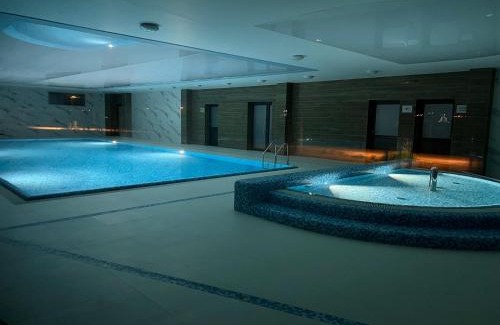Dziwnow Apartment | Blue Paradise Apartment: Oceanfront Spa & Pool Retreat
