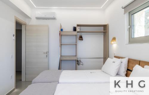Mousata Villa | Enchanting Blue and White Pearl Villas with Private Pool