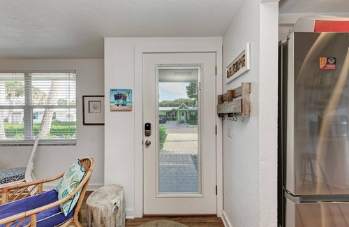 Holmes Beach House | Unforgettable Blue Pelican: Poolside Bliss Near the Beach