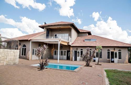 Bloemfontein House | Oceanfront Blue Rain Guest House - 4-Star Ratings Await