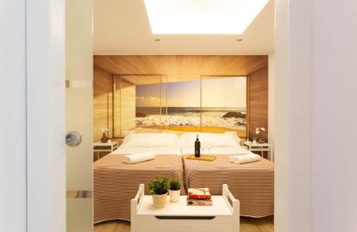 La Malagueta Apartment | Pet Friendly Oceanfront Retreat: Blue & Red by Sol Maestranza