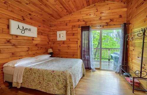 Logan House | Explore Blue Rose Cabins: Family Retreat with Hot Tub