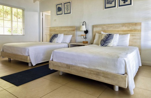 Speyside Hotel | Blue Waters Inn: Relax by the Pool with Ocean Views