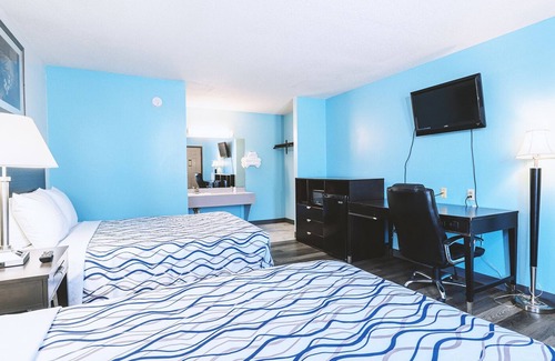 Wellington Hotel | Family-Friendly Sky Palace Inn & Suites with Kitchen Amenities