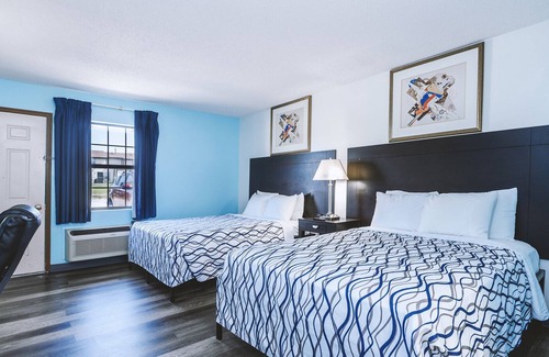 Wellington Hotel | Family-Friendly Sky Palace Inn & Suites with Kitchen Amenities