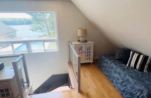 Howe Island Villa | Bluebird Sanctuary: Pet-Friendly Retreat with Pool Access