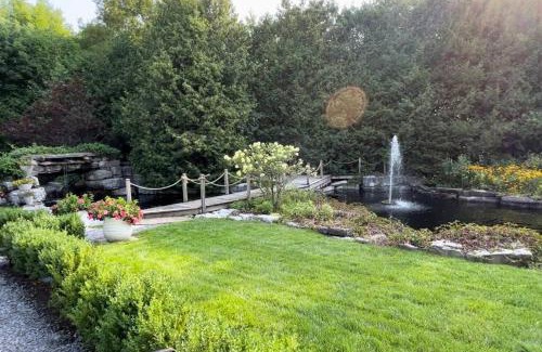 Howe Island Villa | Bluebird Sanctuary: Pet-Friendly Retreat with Pool Access