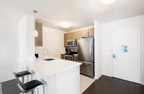 The Waterfront Apartment | Discover Bluebird Suites: Family-Friendly Stays in Jersey City