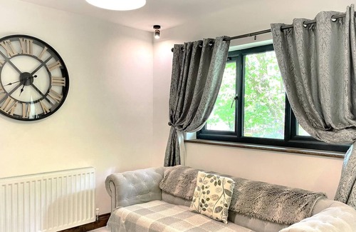 Llanybri House | Relaxing BlueStone Lodge with Hot Tub in Pembrokeshire