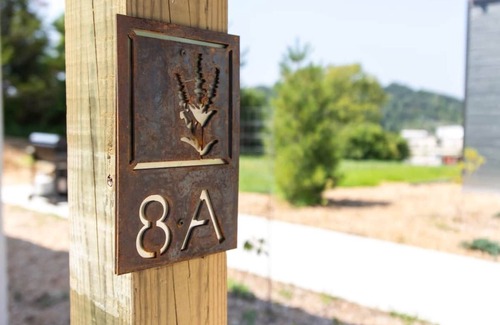 Decorah Villa | Pet Friendly Bluffside Gardens with Top Amenities Await