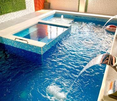 Taytay Apartment | Discover BLUMiERE: Pet-Friendly Retreat with Pool Access