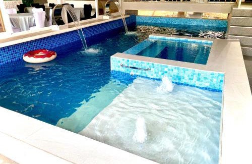 Taytay Apartment | Discover BLUMiERE: Pet-Friendly Retreat with Pool Access