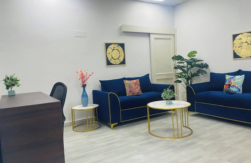 Sushant Lok Apartment | Experience BluO 1BHK with Pool, Kitchen & Balcony Bliss