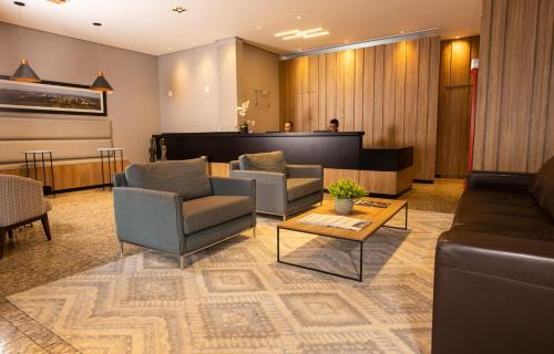 Sao Sebastiao do Paraiso Hotel | Comfortable BM Hotel: 4-Star Stay with Breakfast & Family-Friendly Amenities