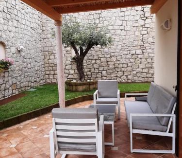 Magugnago Apartment | Indulge in Appartamento DELUXE 1 with Hot Tub & Lake Views