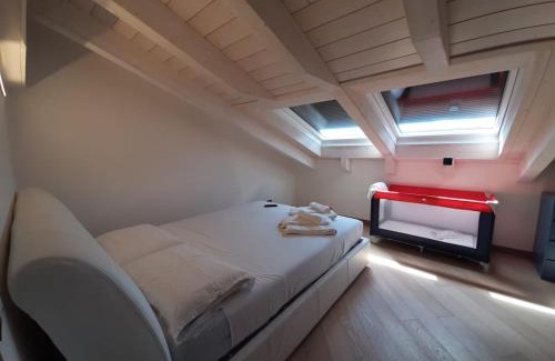 Magugnago Apartment | Indulge in Appartamento DELUXE 1 with Hot Tub & Lake Views