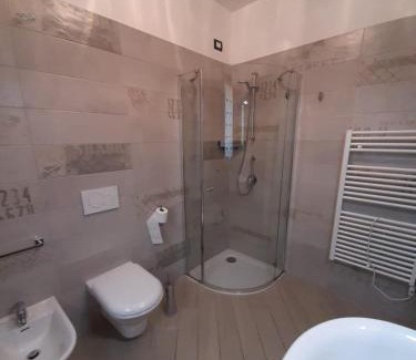 Magugnago House | Indulge in Appartamento DELUXE 2 with Hot Tub & Lake Views