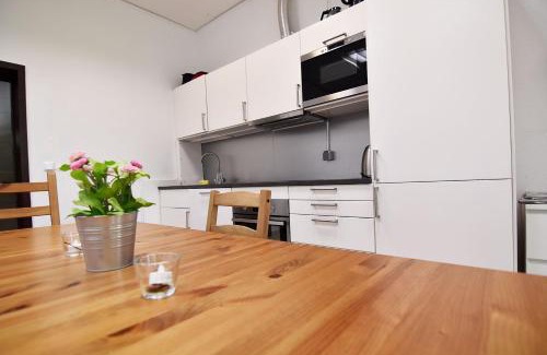 Mauenheim Apartment | Cozy Boardinghouse in Cologne with Free WiFi & Family-Friendly