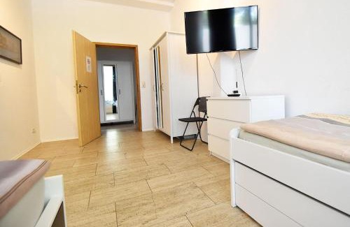 Mauenheim Apartment | Cozy Boardinghouse in Cologne with Free WiFi & Family-Friendly