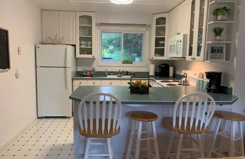 Mayfield House | Experience Boardman River Cottage with Kayaks & Ocean Views