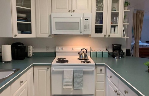 Mayfield House | Experience Boardman River Cottage with Kayaks & Ocean Views