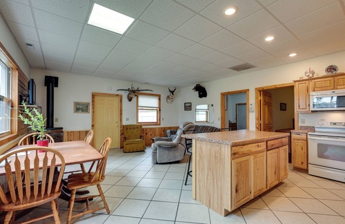 Rhinelander Cottage | Inviting Monico Lakefront Home with Boat Dock & Fire Pit