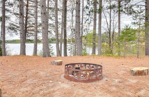 Rhinelander Cottage | Inviting Monico Lakefront Home with Boat Dock & Fire Pit