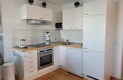 Ostvorpommern Boat Rental | Unique Floating Houseboat Retreat at Kröslin Marina