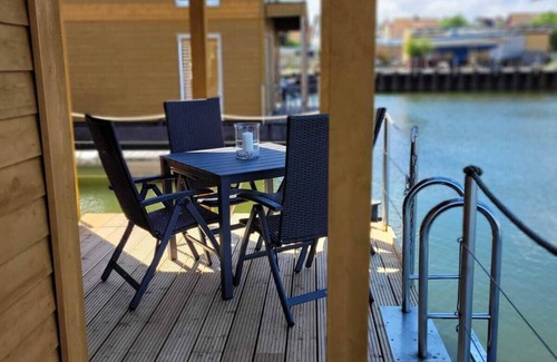 Ostvorpommern Boat Rental | Unique Floating Houseboat Retreat at Kröslin Marina