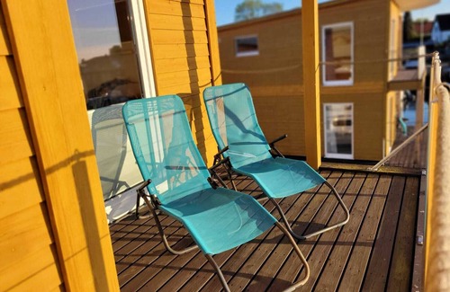 Ostvorpommern Boat Rental | Unique Floating Houseboat Retreat at Kröslin Marina