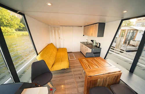 Schwerin Boat Rental | Beautiful 'Hausboot Explorer' with Lake View & Terrace