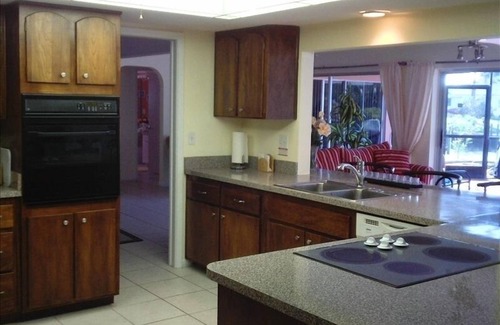 Pelican House | Boater's Dream: Poolside Retreat Near Open Water Awaits