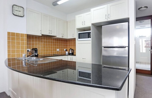 Tea Gardens Apartment | Relaxing Poolside Retreat at Boathouse 107 Apartment