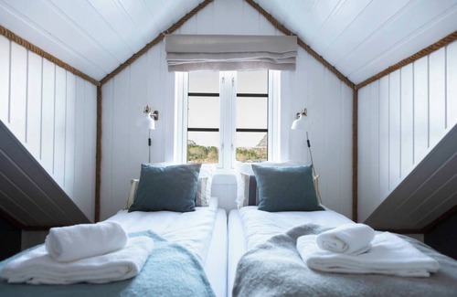 Afjord Apartment | Seaside Boathouse with Floating Sauna and BBQ Amenities