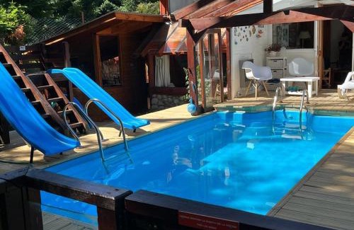 Villa La Angostura House | Relax at BOG Costa de Rio - Pool, Hot Tub & River Views