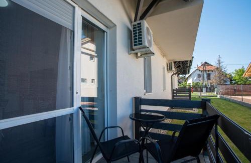 Balatonboglar Apartment | Experience Boglári Apartman: Family-Friendly Retreat