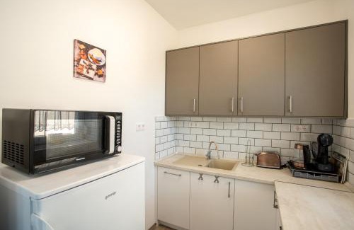 Balatonboglar Apartment | Experience Boglári Apartman: Family-Friendly Retreat