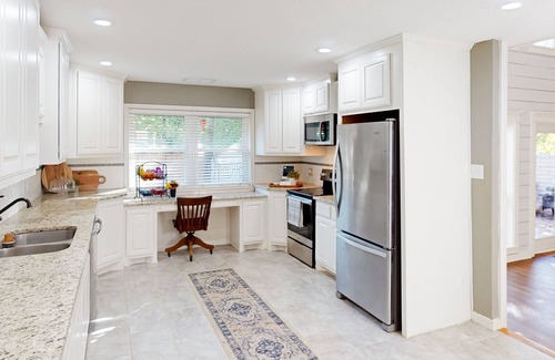 Abilene House | Inviting Bohemian Retreat with Patio, Spa & Family Amenities
