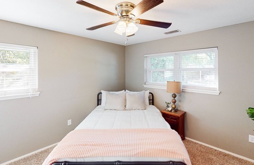 Abilene House | Inviting Bohemian Retreat with Patio, Spa & Family Amenities