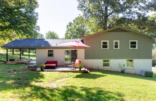 Newton House | Stylish Bohemian Retreat with Hot Tub and Family Amenities