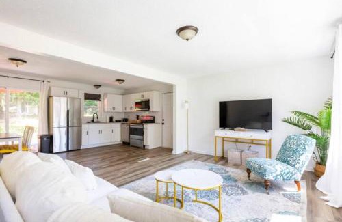 Newton House | Stylish Bohemian Retreat with Hot Tub and Family Amenities
