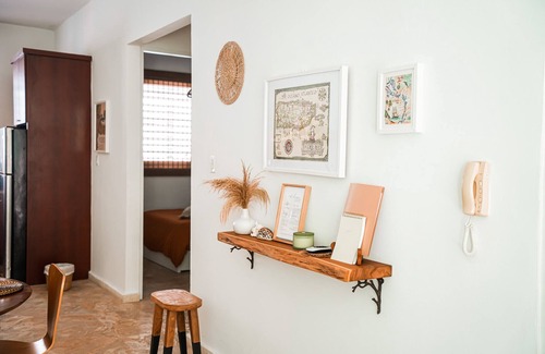 Puerta de Tierra Apartment | Cozy Boho Oasis Steps from the Beach with Family Amenities