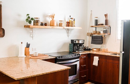 Puerta de Tierra Apartment | Cozy Boho Oasis Steps from the Beach with Family Amenities